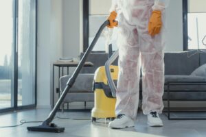 A Close-Up Shot of a Person Using a Vacuum Cleaner